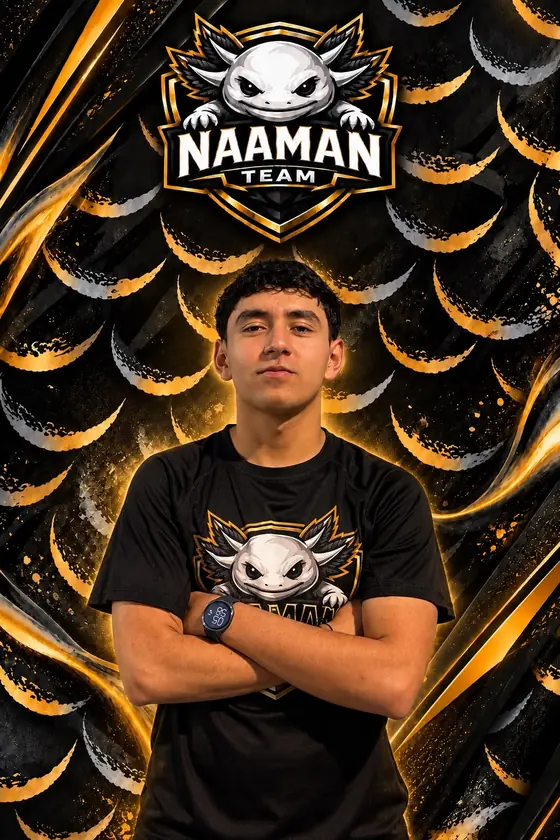 Coach Javier Ruiz con los brazos cruzados, playera NAAMAN Team